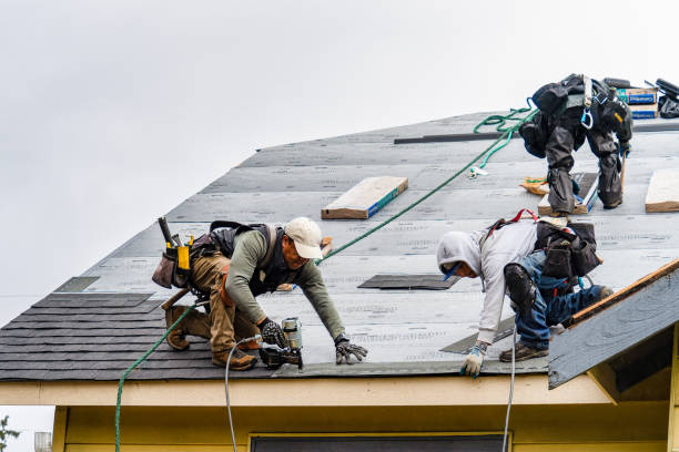 Professional Roofing technician working in Lynchburg, MS